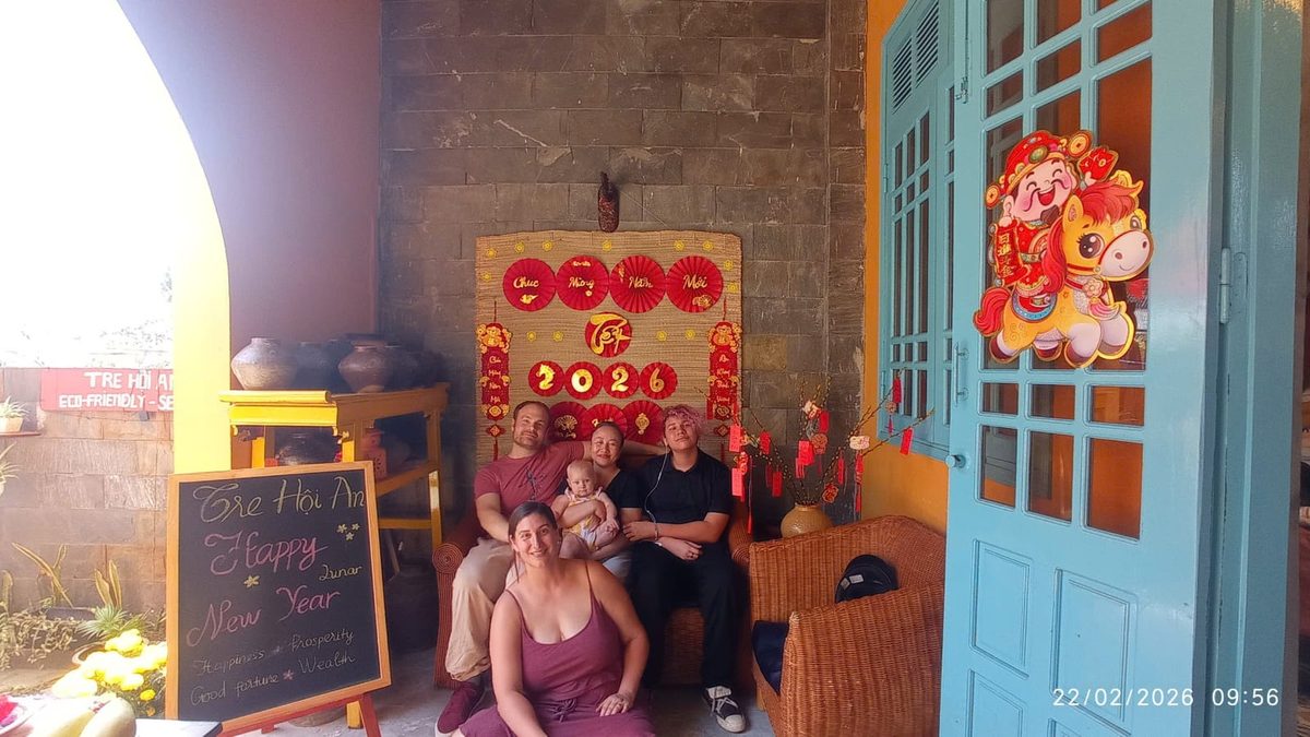 Celebrating Lunar New Year together at Tre Hoi An — hosts and guests with Tet decorations