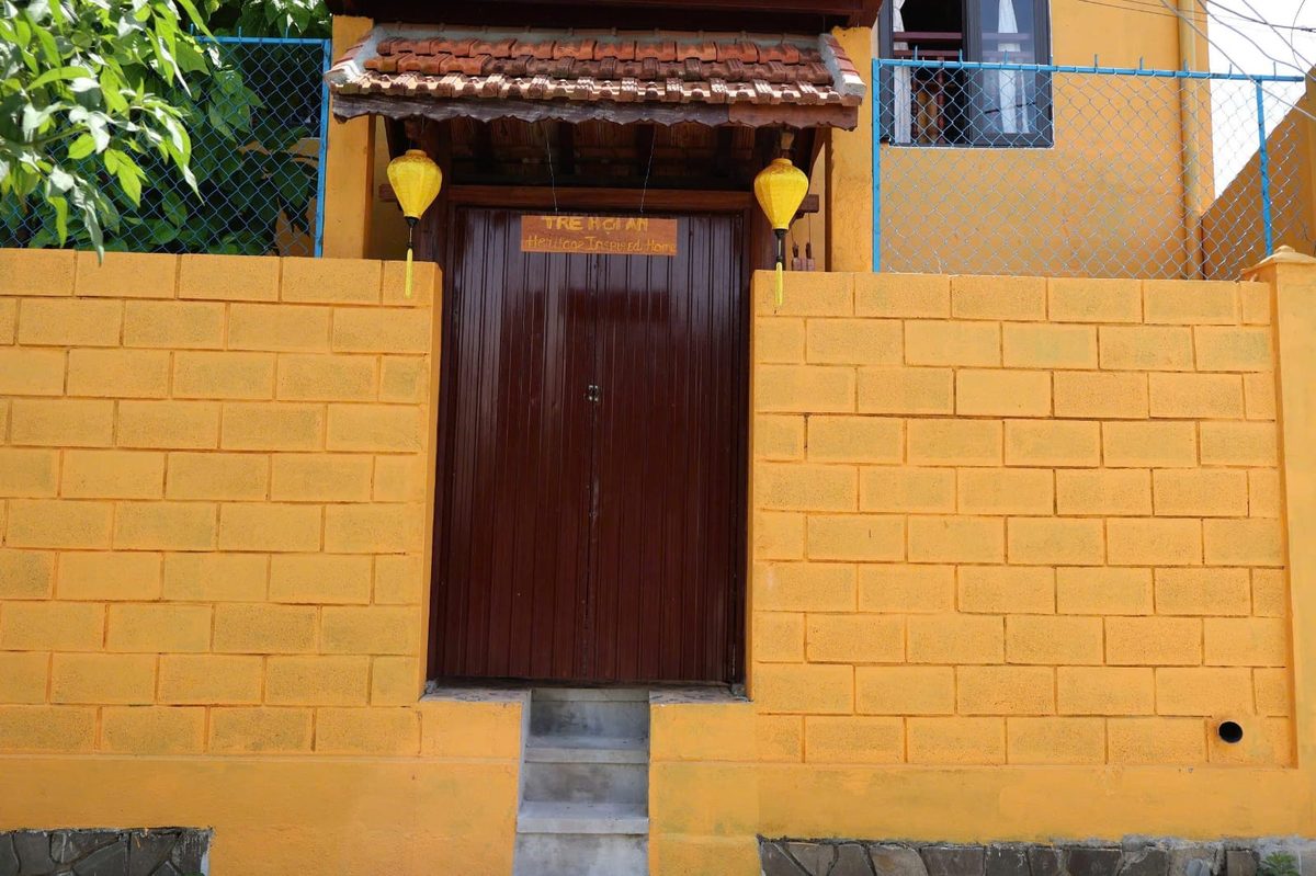 The front door of Tre Hoi An, flanked by silk lanterns