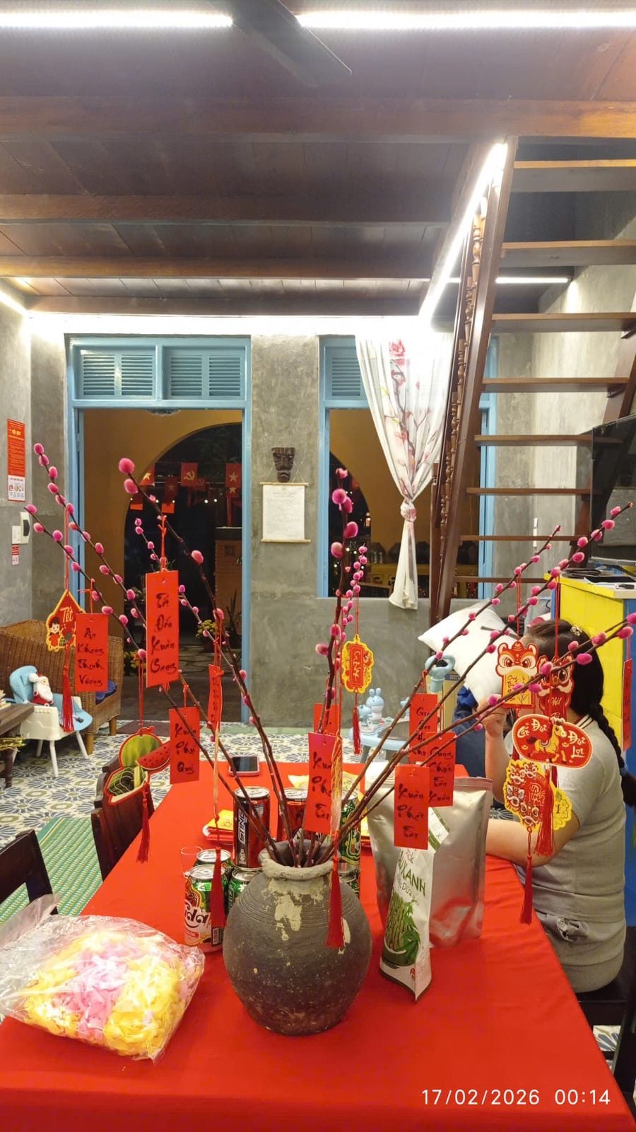 Peach blossoms and Tet wishes inside the heritage house